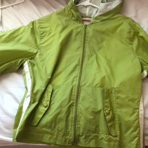 green windbreaker with strip